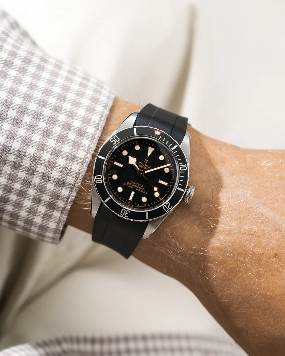 Black FKM rubber watch strap from Wristbuddys with a Tudor BB41 Heritage black dial on a person's wrist