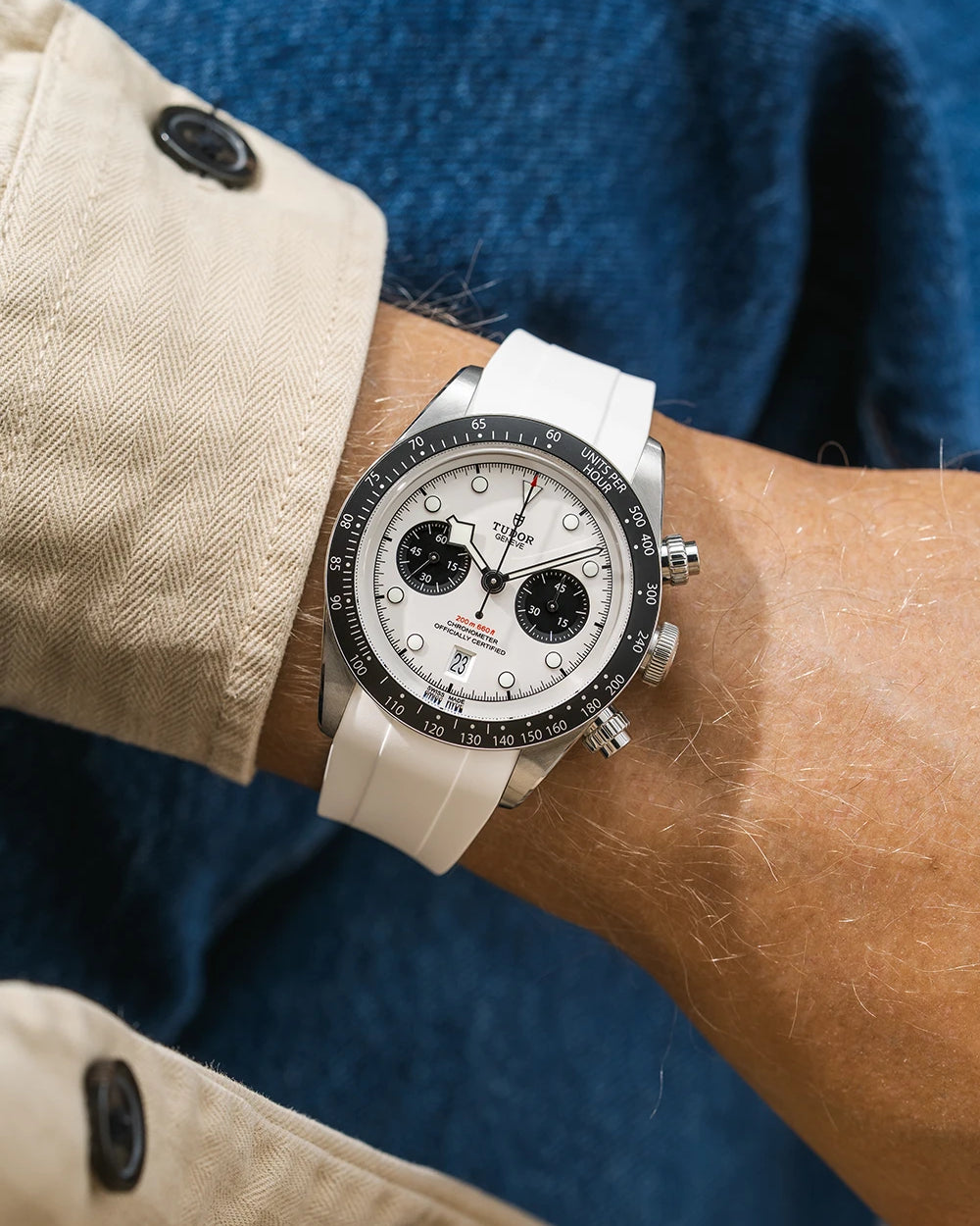 white FKM rubber watch strap from Wristbuddys with a Tudor Chrono white dial on a person's wrist
