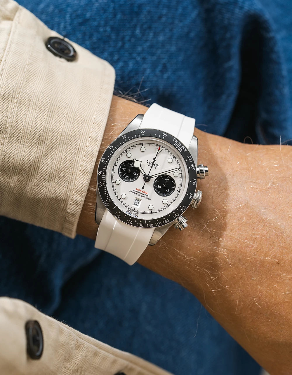 white FKM rubber watch strap from Wristbuddys with a Tudor Chrono white dial on a person's wrist