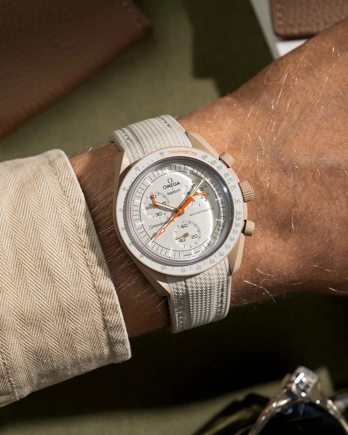 Beige curved vertech rubber strap for MoonSwatch – photographed on Mission to Jupiter