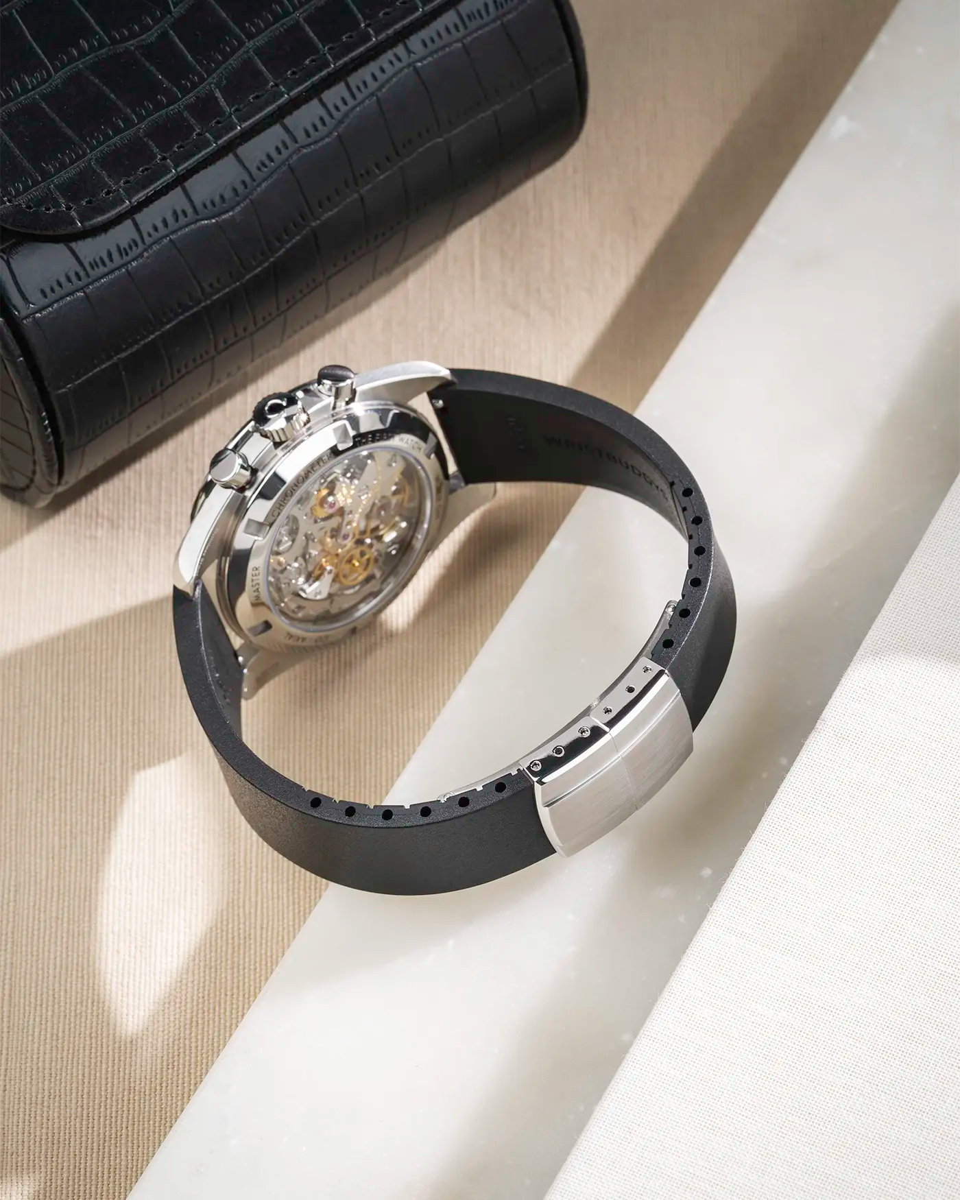 The back of a black CTS FKM Rubber Strap 19-22mm on a watch to show the fit and the clasp from behind