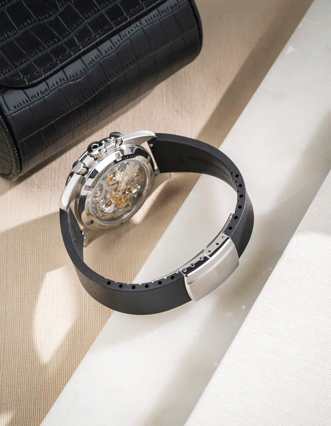 The back of a black CTS FKM Rubber Strap 19-22mm on a watch to show the fit and the clasp from behind