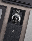 Black leather watch pouch by Wristbuddys with Rolex Daytona placed inside open case – premium leather storage for luxury watches