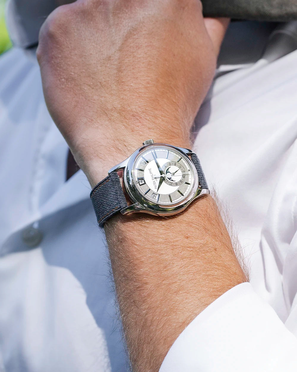 Dark Grey Denim Watch Strap 20mm with orange stitching on a Patek Philippe - wrist shot