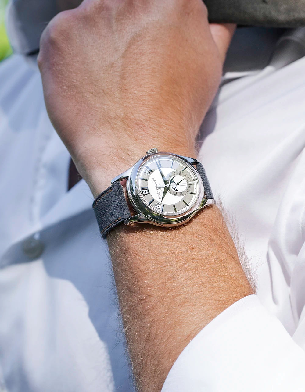 Dark Grey Denim Watch Strap 20mm with orange stitching on a Patek Philippe - wrist shot