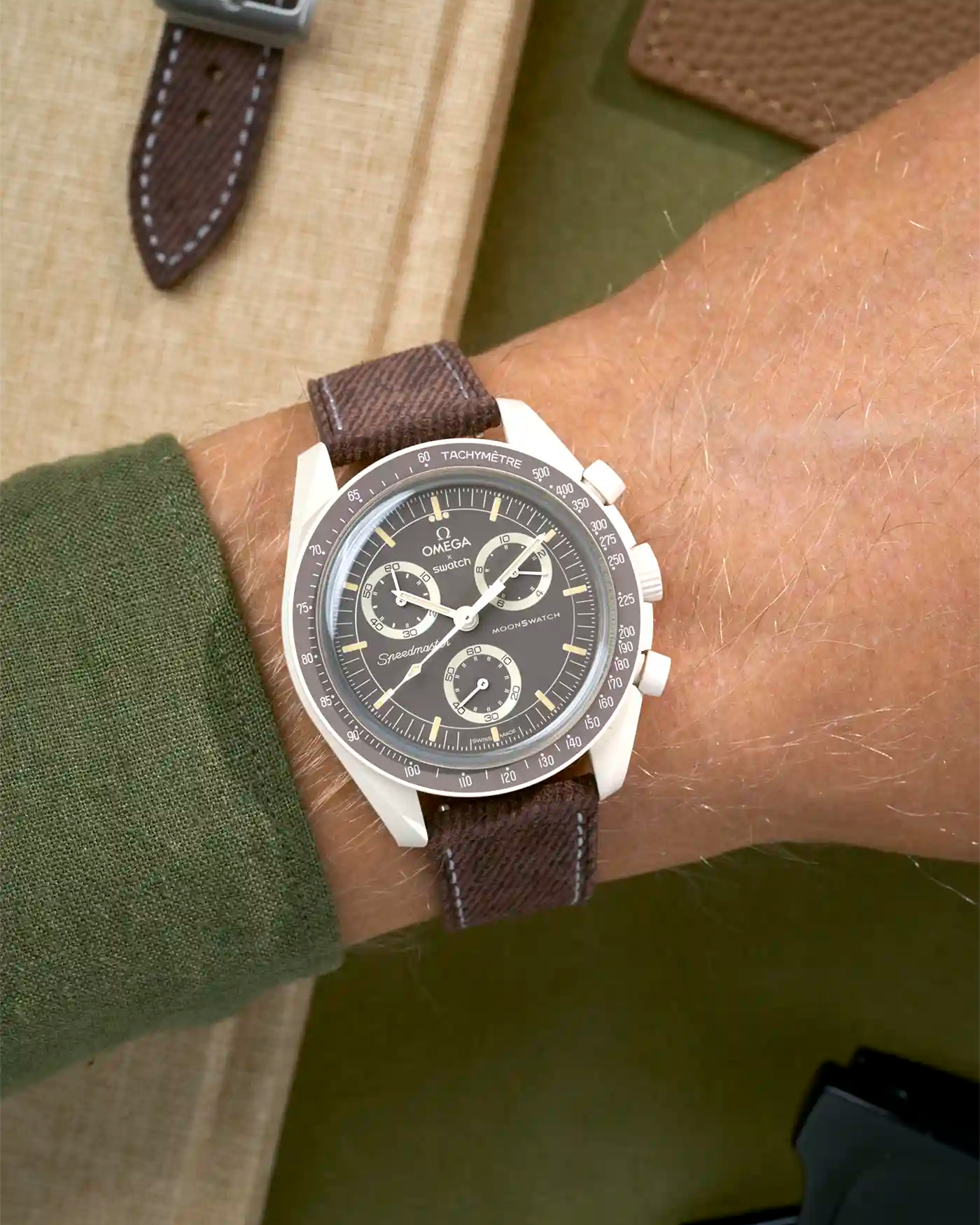 Brown denim strap on Omega X Swatch Mission on Earth - Desert, wrist view