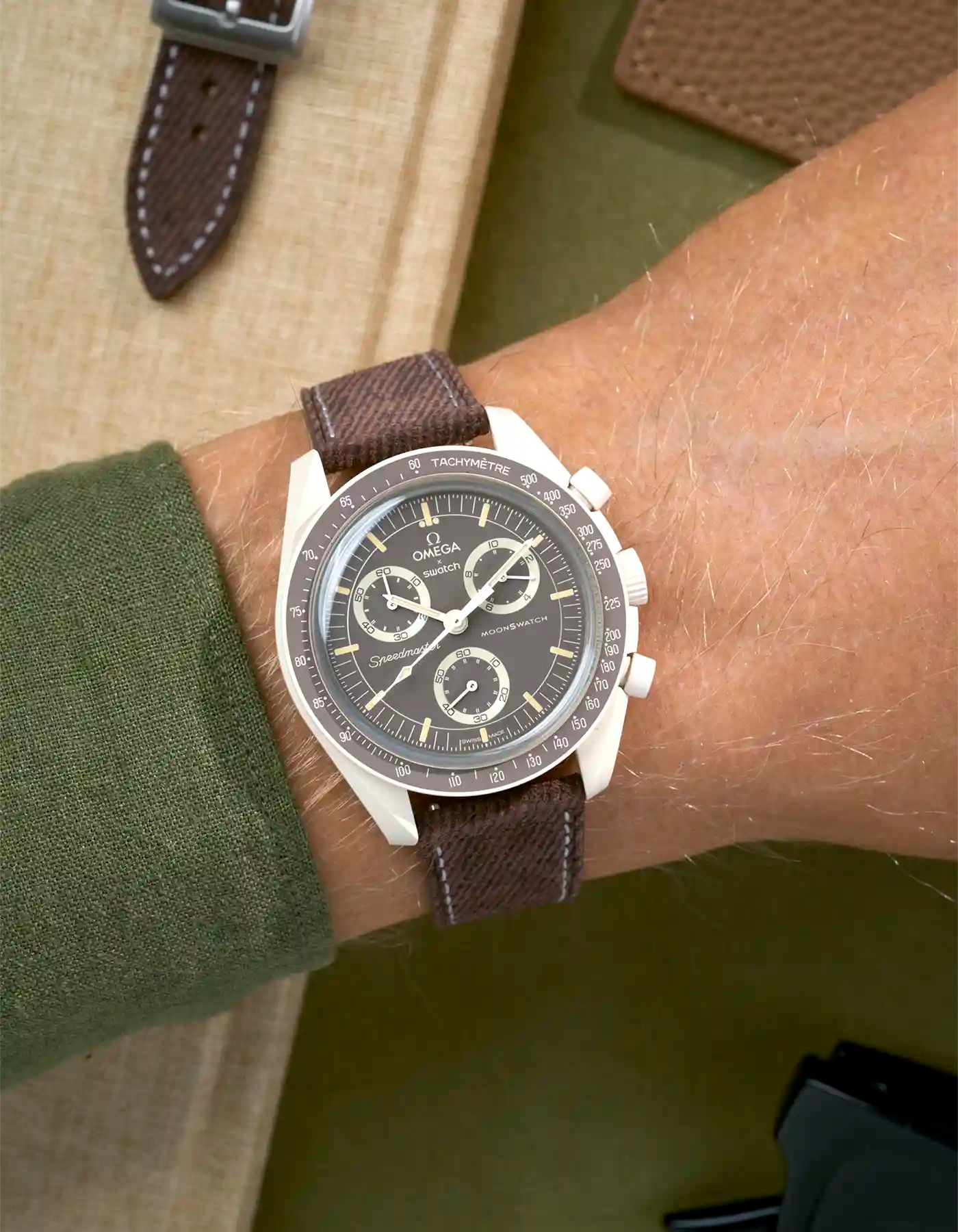 Brown denim strap on Omega X Swatch Mission on Earth - Desert, wrist view