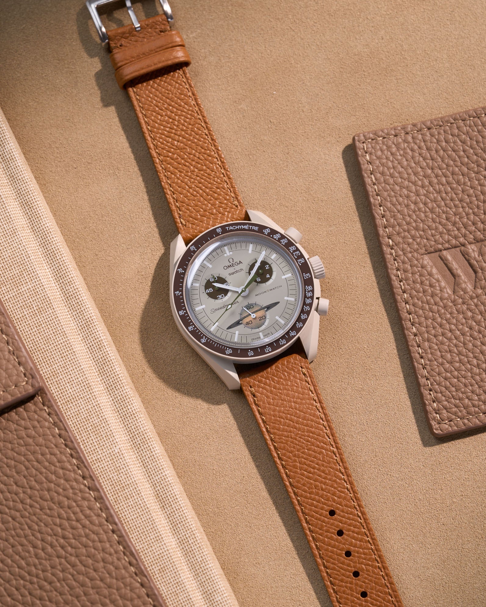 Flat lay of Brown Epsom leather strap for Omega x Swatch MoonSwatch Saturn