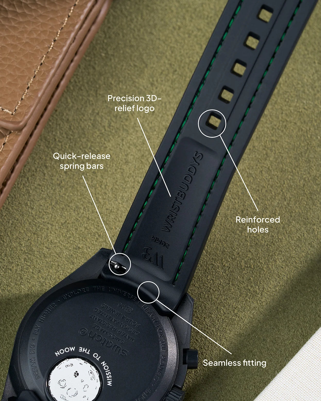 Black curved rubber strap with green stitching, reinforced holes, quick-release spring bars and seamless integration with watch case