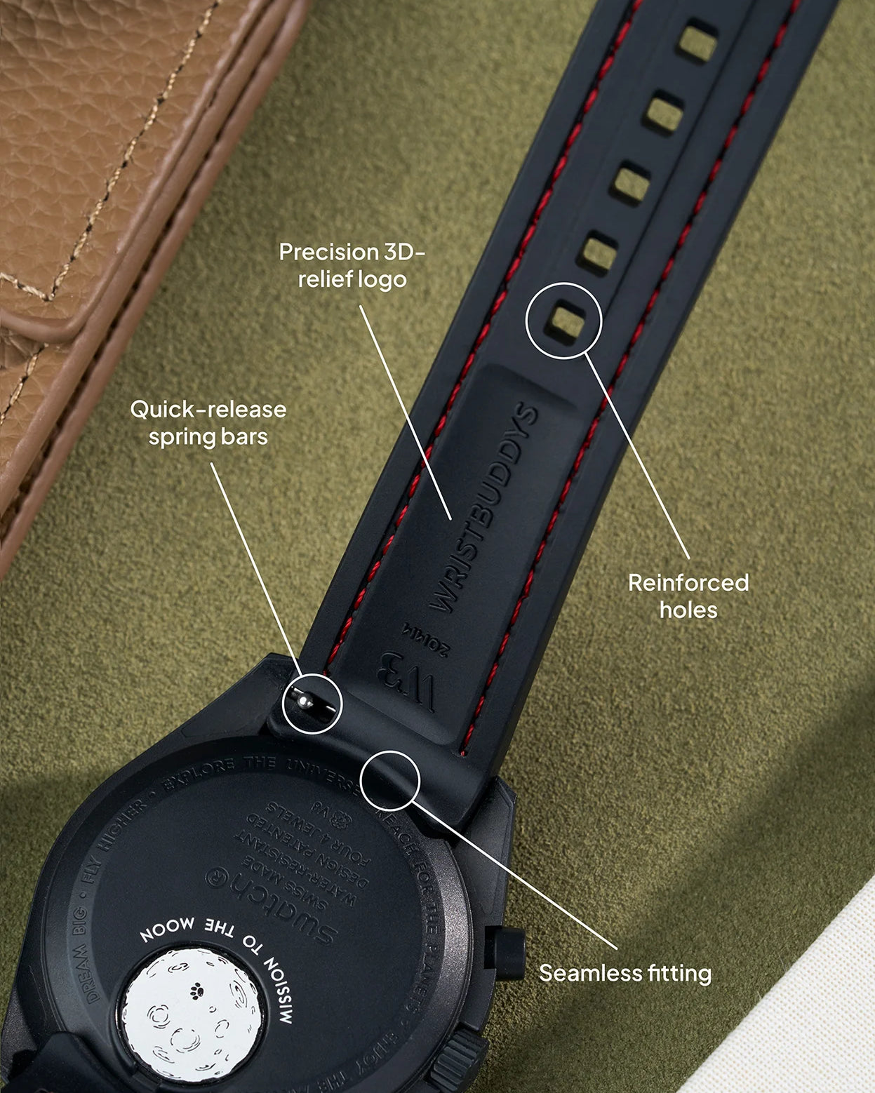 Black curved rubber strap with red stitching, quick-release spring bars, seamless case integration and 3D-relief Wristbuddys logo
