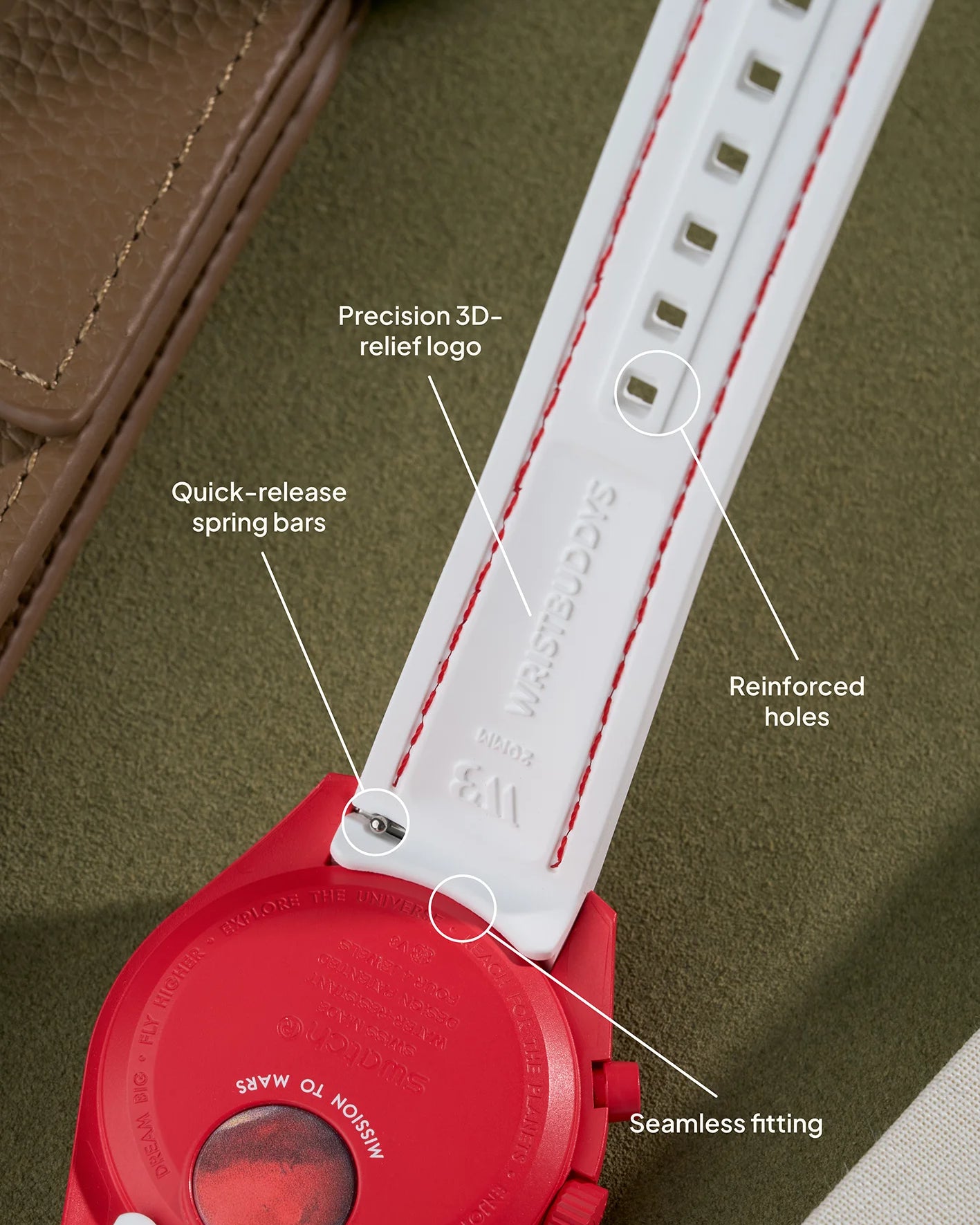 White curved rubber watch strap with red stitching, quick-release spring bars, reinforced holes and embossed Wristbuddys logo