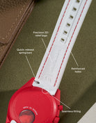White curved rubber watch strap with red stitching, quick-release spring bars, reinforced holes and embossed Wristbuddys logo