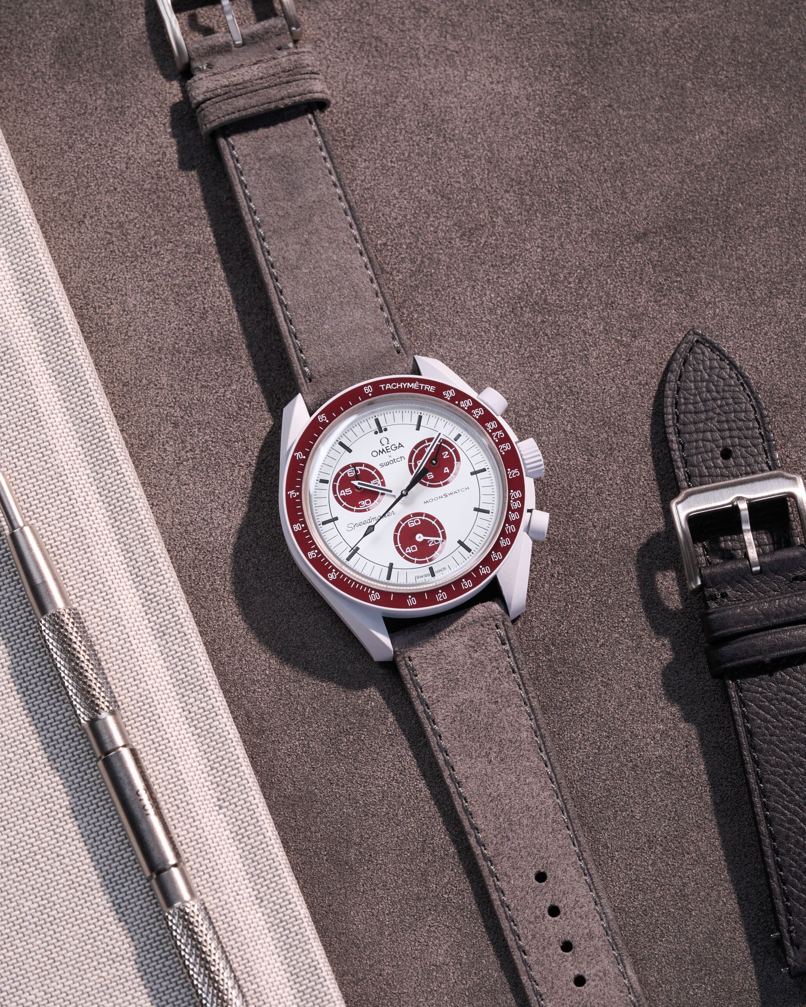 Leather Strap for Omega X Swatch Mission to Pluto in grey suede – watch lying flat