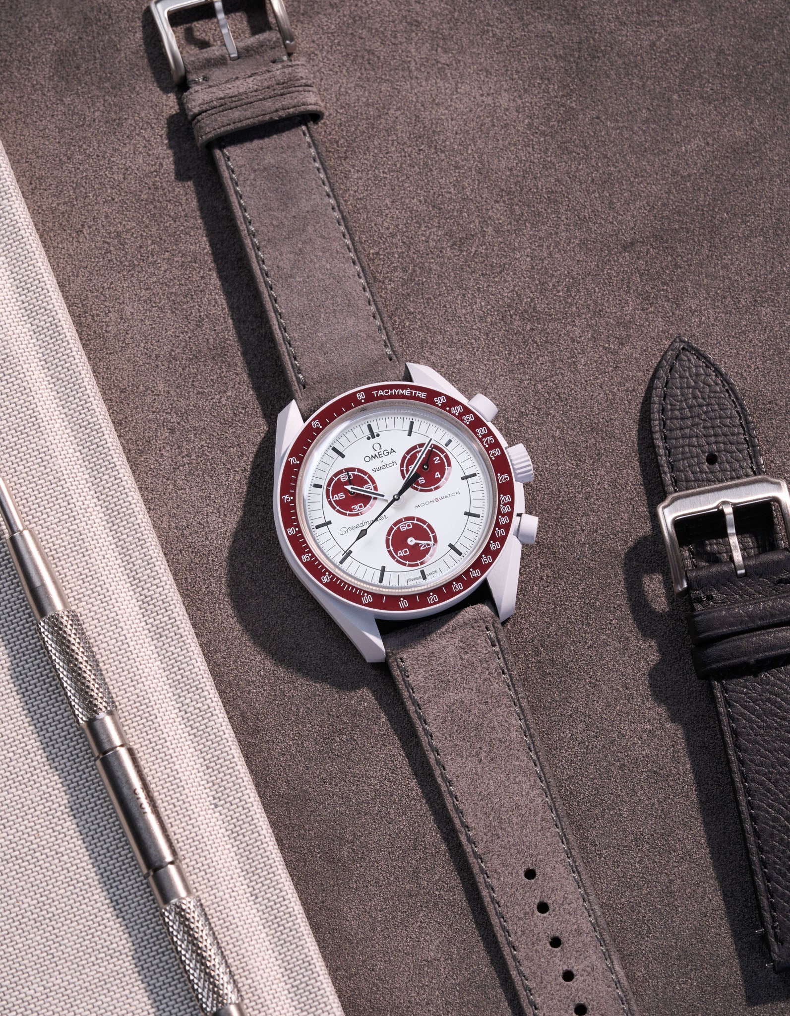 Leather Strap for Omega X Swatch Mission to Pluto in grey suede – watch lying flat