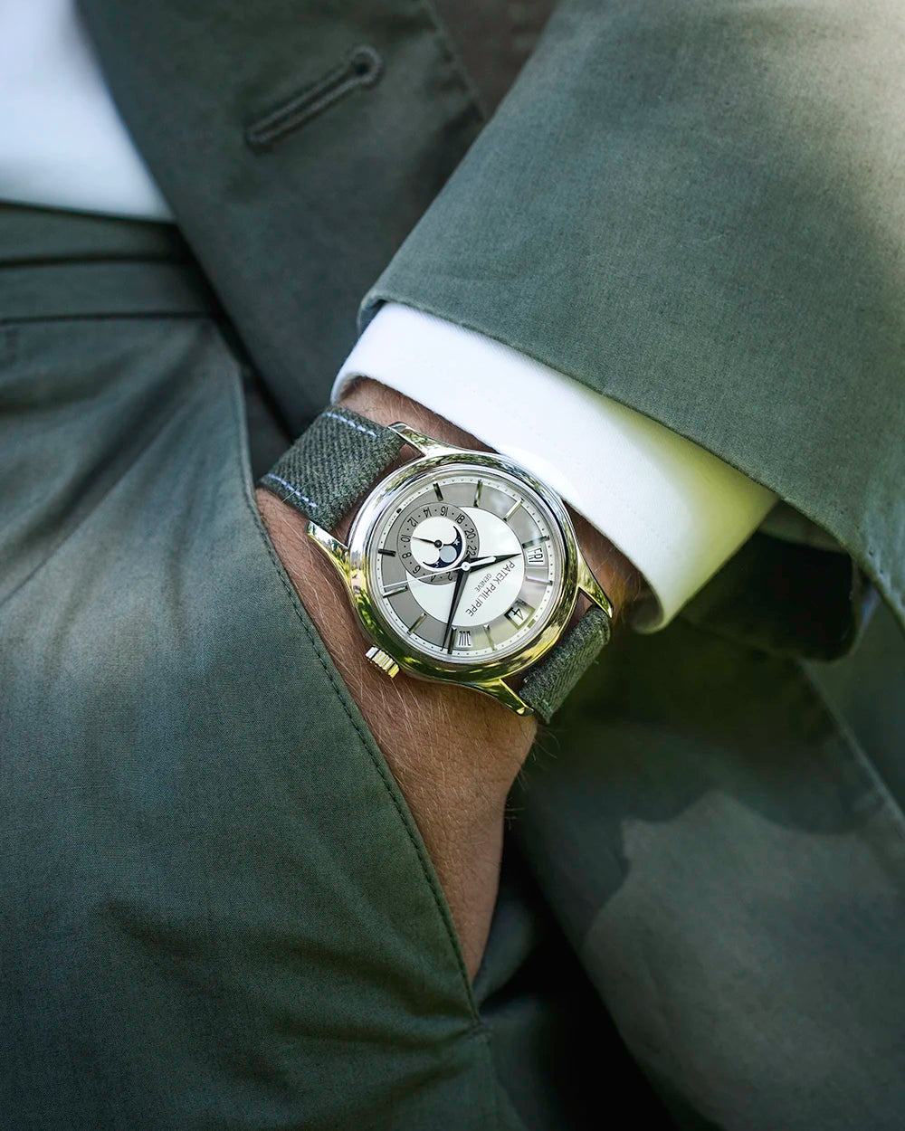 Military Green Denim Strap on Patek Philippe – wrist shot styled with suit