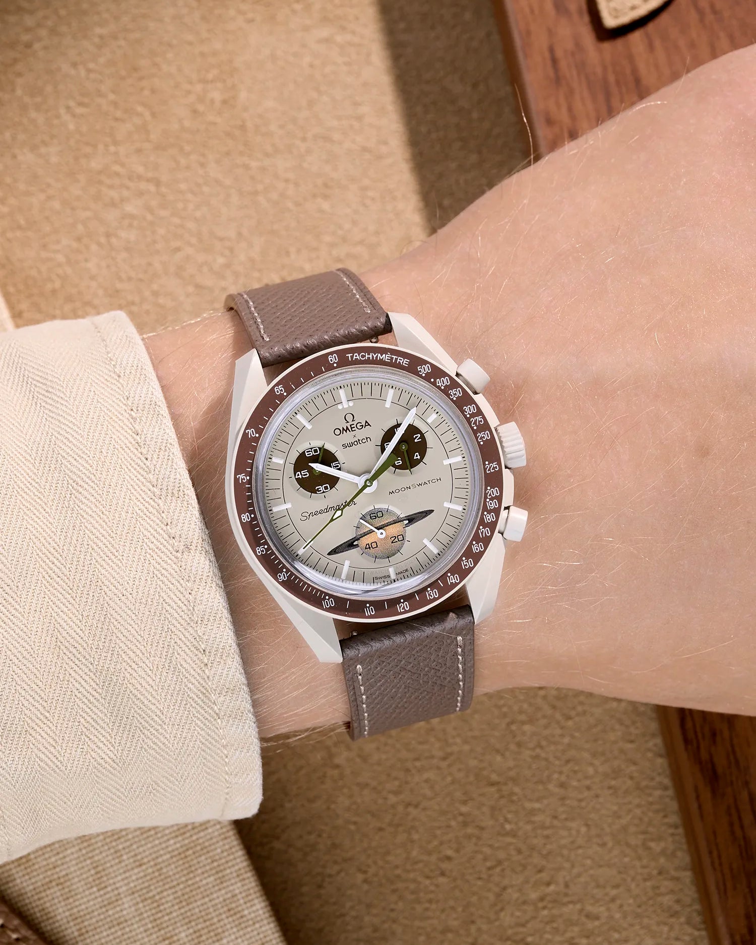 Grey Epsom leather strap on Omega X Swatch MoonSwatch Mission to Saturn – wrist shot