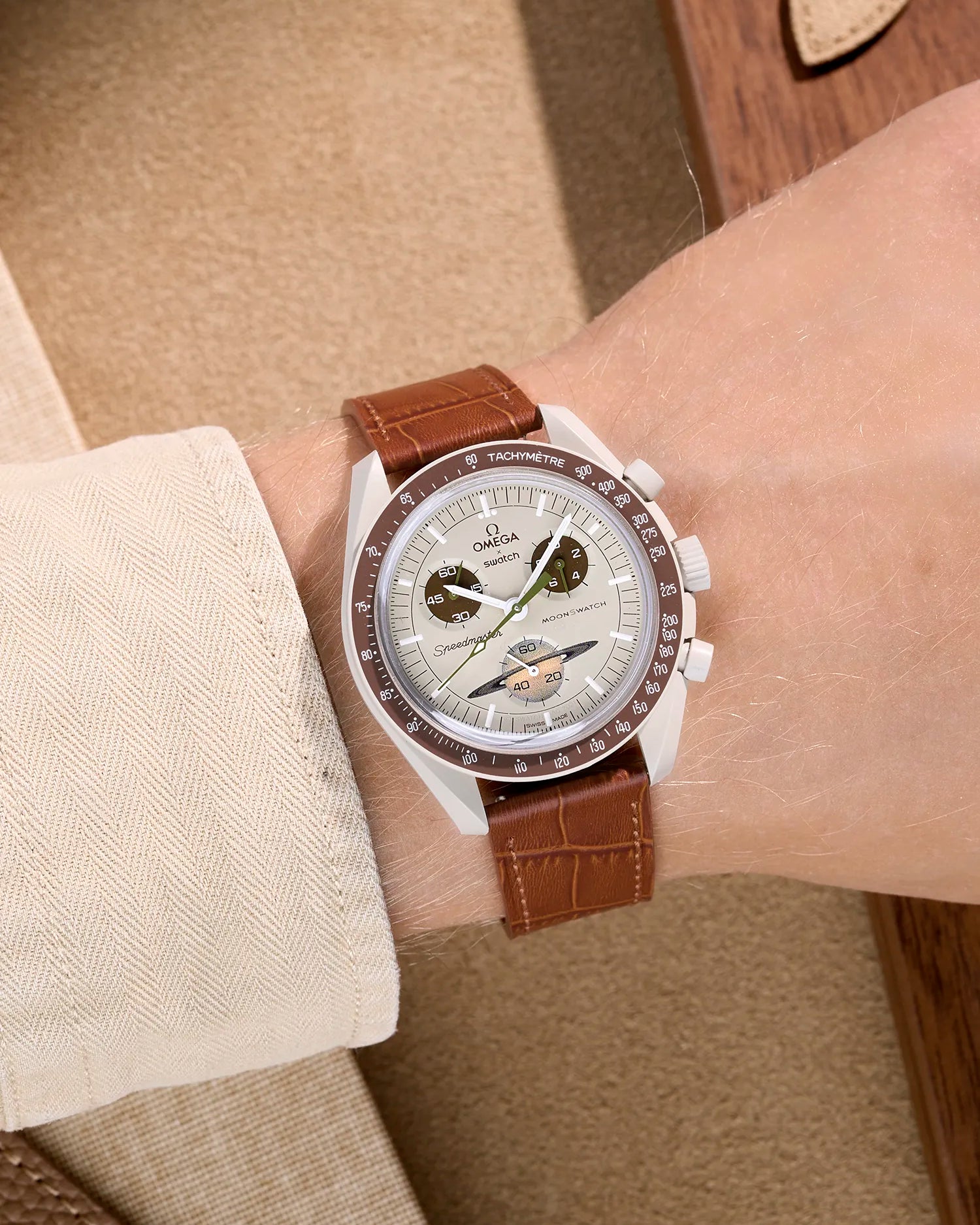 Light Brown embossed alligator leather strap on Omega X Swatch MoonSwatch Mission to Saturn – wrist shot