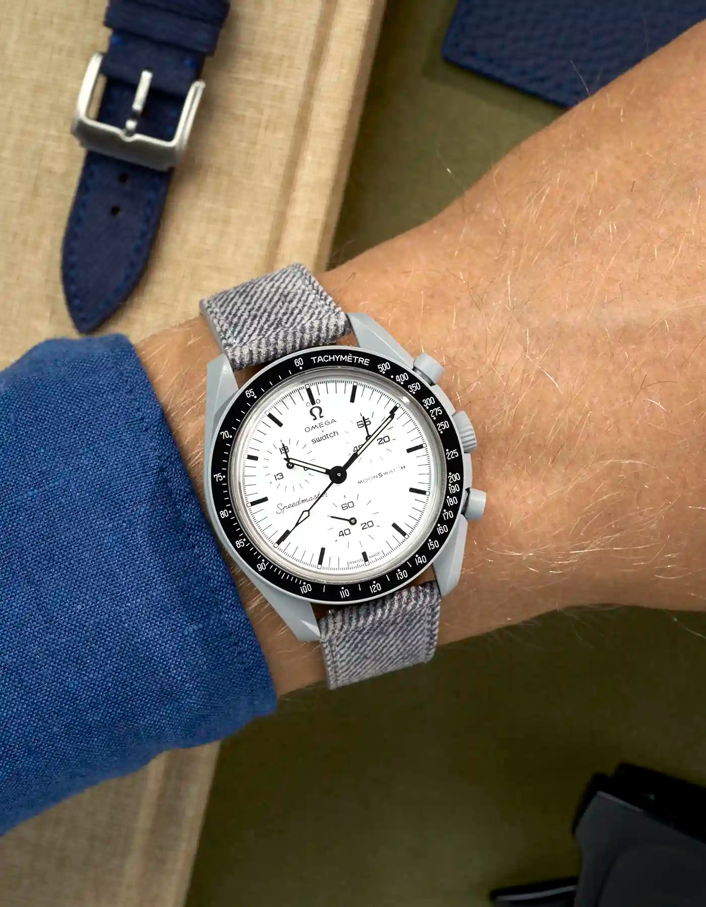 Light Grey Denim Watch Strap on Omega x Swatch MoonSwatch 1965 with black and white dial - wrist shot