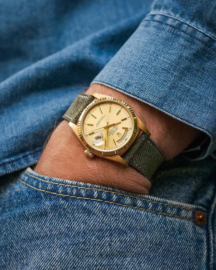 Military Green Denim Strap on gold Rolex Datejust – wrist shot styled with denim shirt