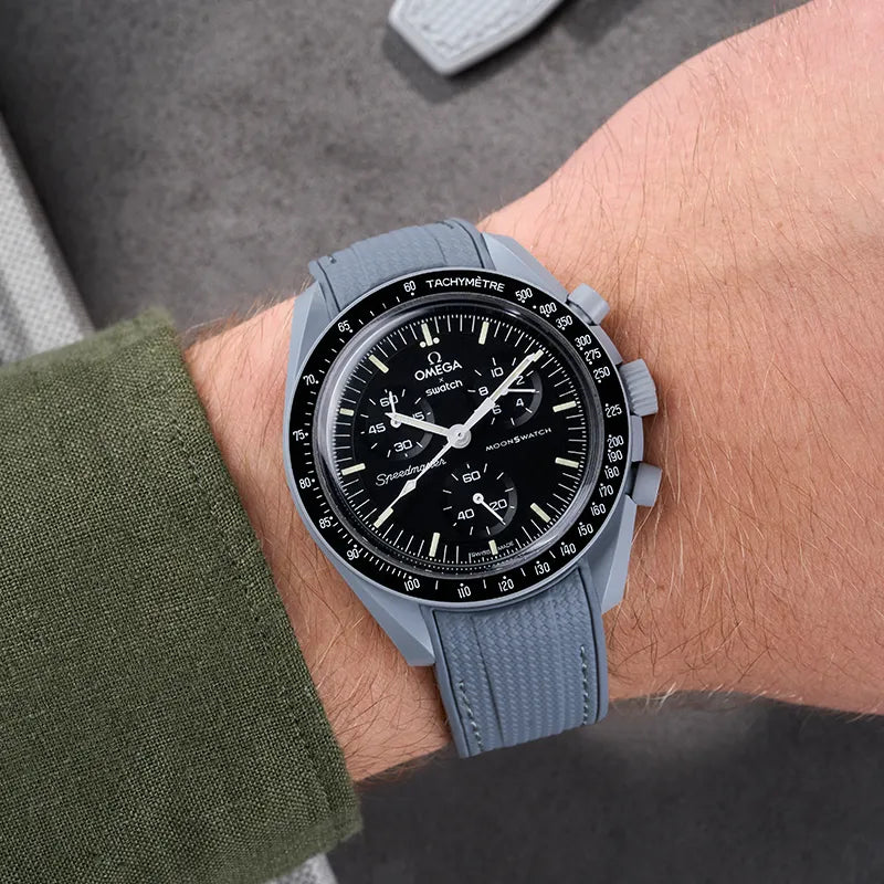 Close-up of the Omega X Swatch Mission to the Moon watch with a sleek grey rubber strap, showcasing its premium design and durability on a wrist. Perfectly crafted strap for Mission to the Moon, ideal for everyday wear.