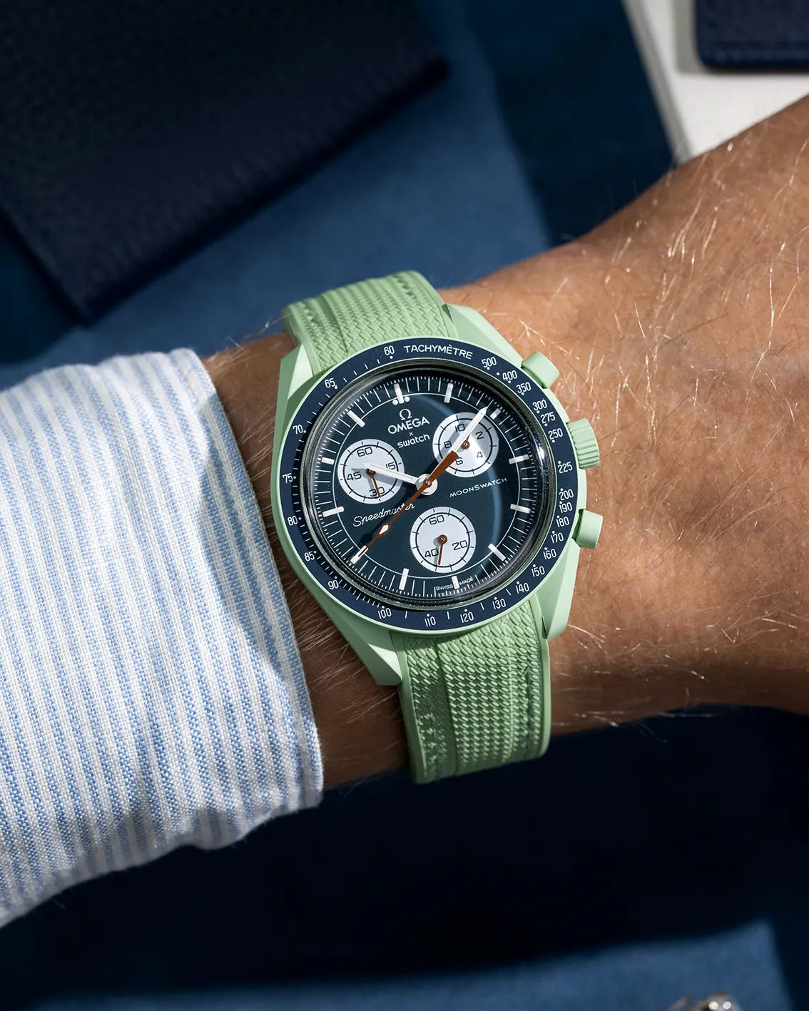 MoonSwatch Mission on Earth with mint green curved rubber strap – wrist shot