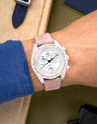 Omega X Swatch MoonSwatch Mission to the Full Moonphase on wrist with pink denim strap
