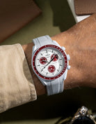 Curved Vertech rubber strap for MoonSwatch Mission to Pluto – grey strap wrist shot