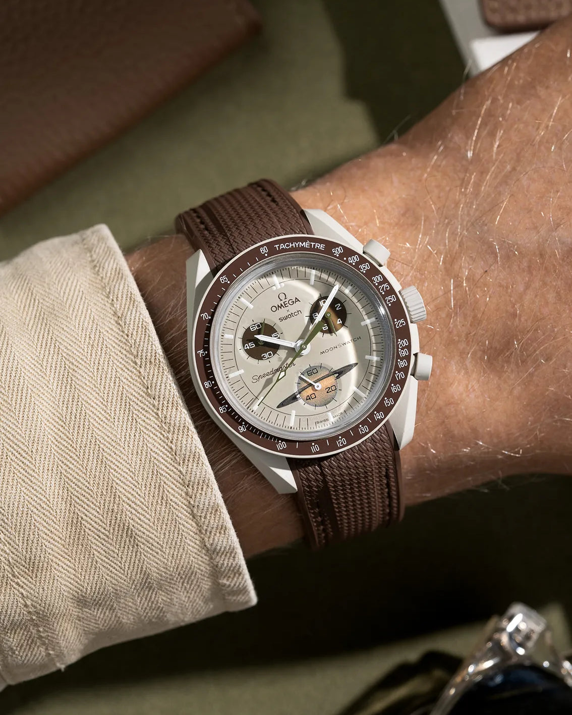 Curved rubber strap for Omega x Swatch MoonSwatch Mission to Saturn – brown strap mounted on watch
