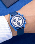 Omega X Swatch Mission to Super Blue Moonphase with Navy Blue Epsom leather strap worn on wrist