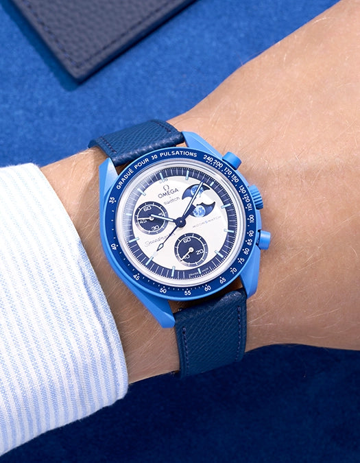 Omega X Swatch Mission to Super Blue Moonphase with Navy Blue Epsom leather strap worn on wrist