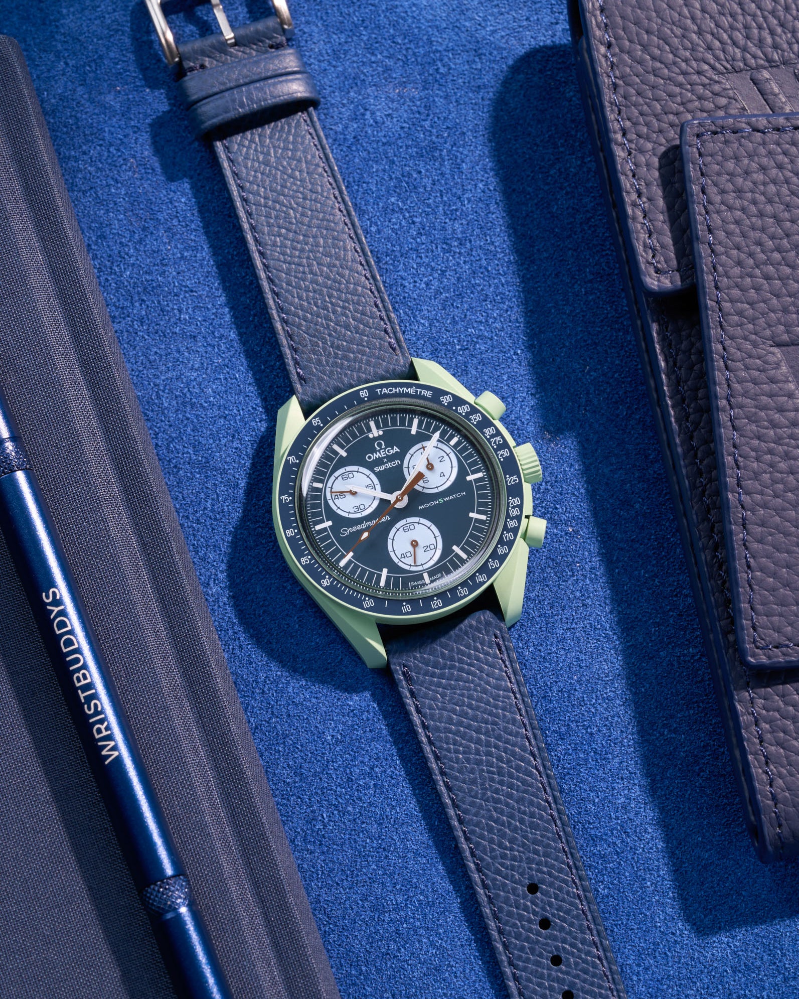 Flat lay of Navy Blue Epsom leather strap for Omega x Swatch MoonSwatch Mission on Earth