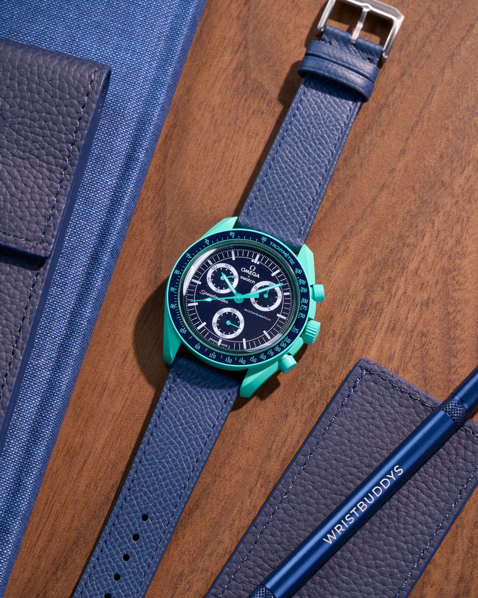 Flat lay of Navy Blue Epsom leather strap for Omega x Swatch MoonSwatch Mission on Earth Polar Lights