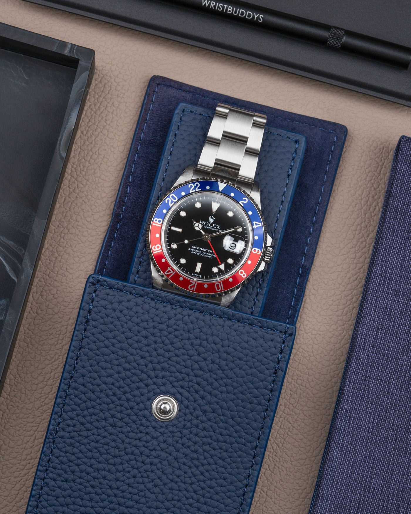 Detail image of Navy Blue Leather Watch Pouch with a Rolex inside - Wristbuddys