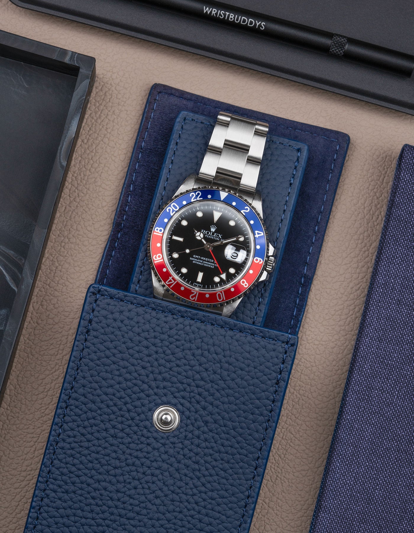 Detail image of Navy Blue Leather Watch Pouch with a Rolex inside - Wristbuddys