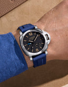 Wrist shot showing Navy Blue Vertech FKM rubber strap on Panerai Luminor GMT