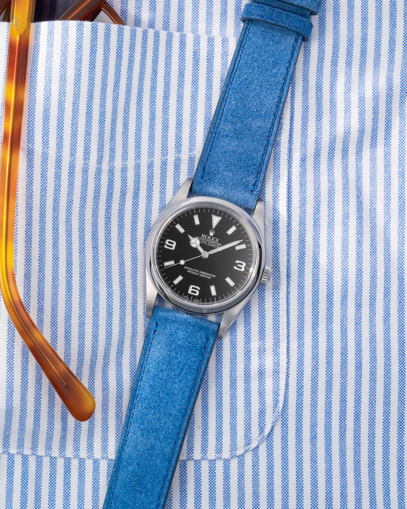 Ocean Blue Suede Leather Strap - 17 - 21mm on Rolex flat lay on shirt