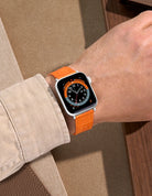 Wrist shot on Orange Embossed Alligator Leather Apple Watch Band