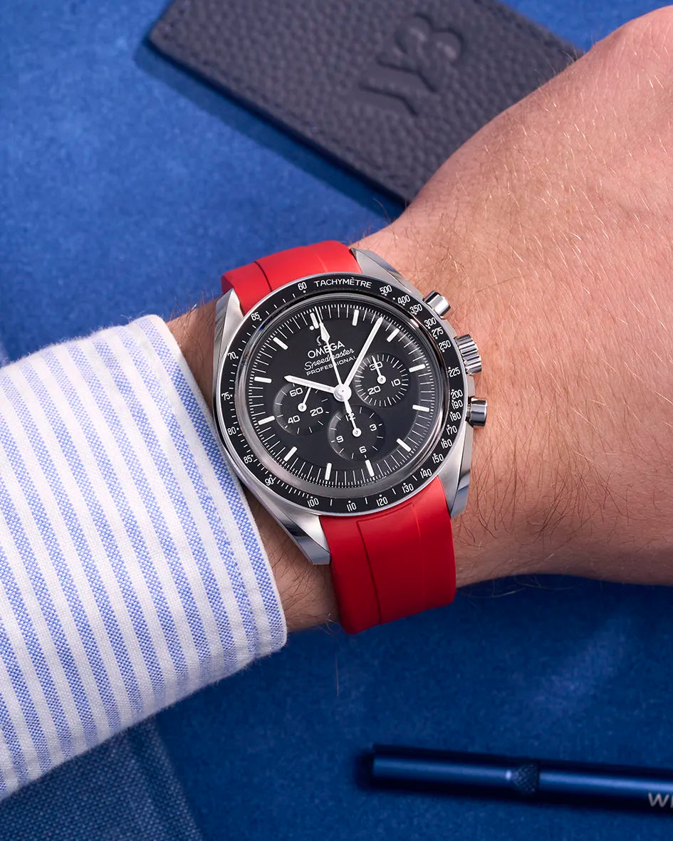 Red FKM rubber strap on Omega Speedmaster – wrist shot showing watch on wrist