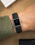 Rubber sailcloth leather strap paired with black dial dress watch – sleek everyday combination