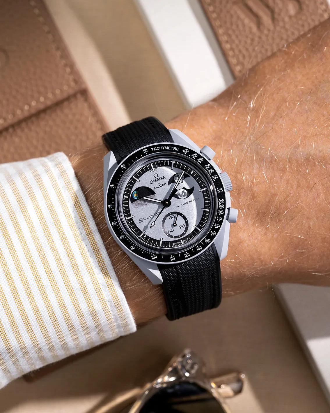 Black curved vertech rubber strap for MoonSwatch – wrist shot on Mission to the EarthPhase