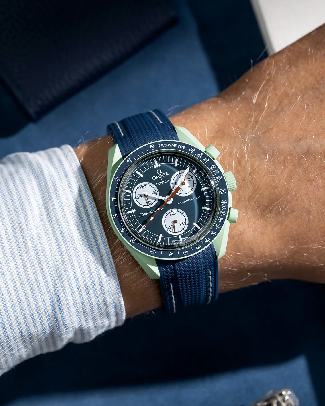 navy blue with white stitches rubber strap for MoonSwatch, photographed on Mission on Earth – navy blue with white stitches wrist shot