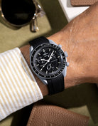 Black rubber strap designed specifically for MoonSwatch Mission to the Moon – wrist shot