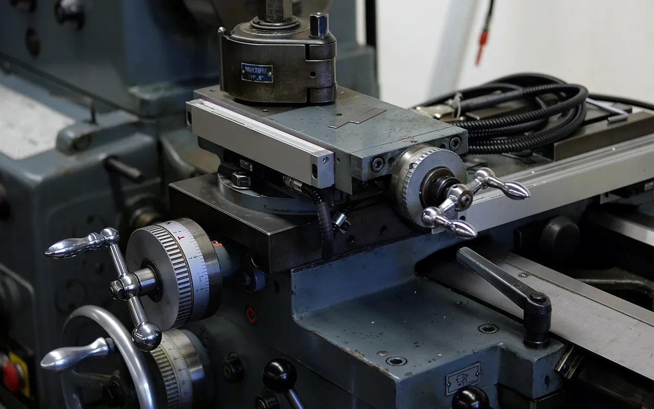 Industrial machine used in the Wristbuddys rubber strap production process for injection molding and heat pressing