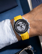 Curved yellow Vertech rubber strap for Omega X Swatch MoonSwatch – photographed on the Mission to the EarthPhase wrist shot
