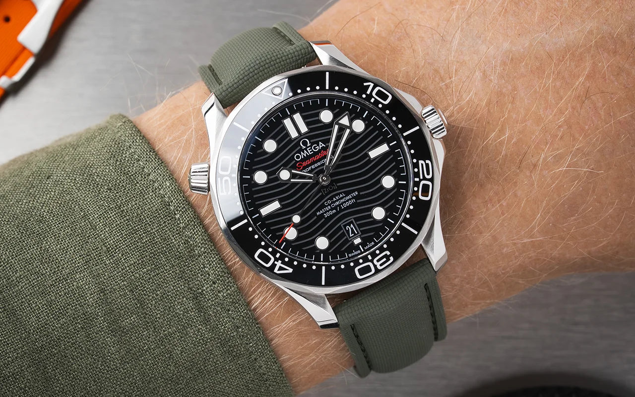 Image of an omega seamster with a green sailcloth watch strap showing on our sailcloth collection page