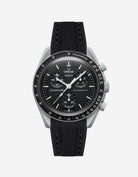 Black Omega watch with a detailed face on a white background