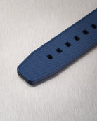 Navy blue Vertech FKM rubber strap for Omega Seamaster 300 Diver with textured finish on a white background