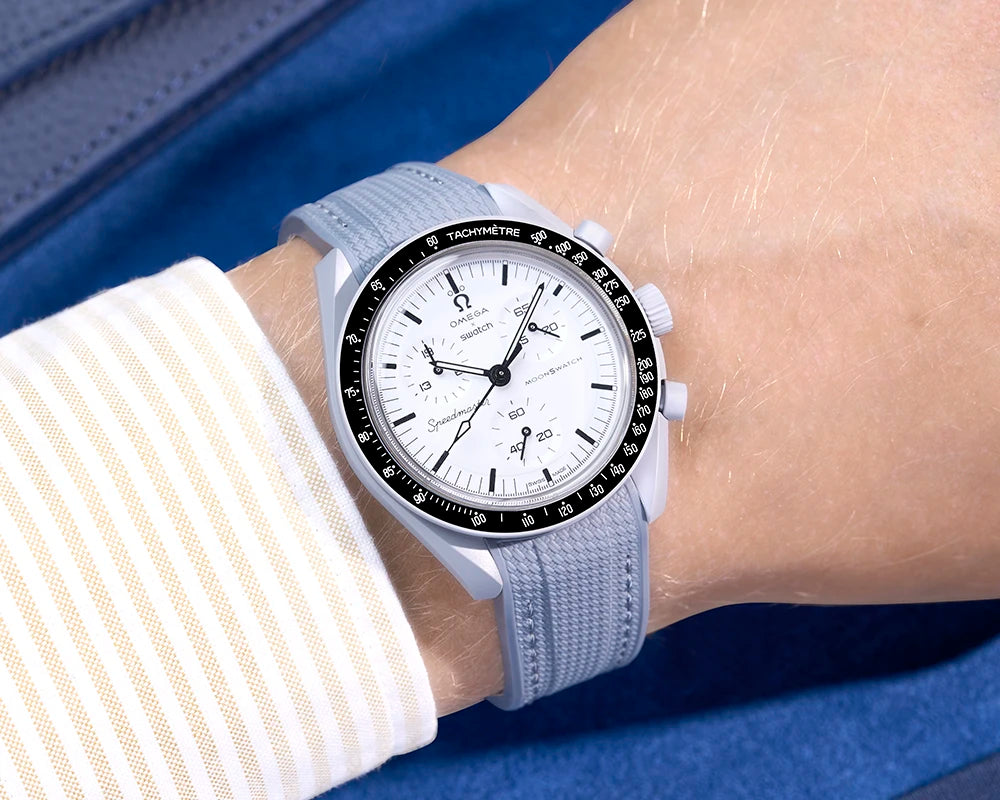 Wrist shot of Omega x Swatch MoonSwatch with grey Vertech Rubber Strap – stylish everyday wear