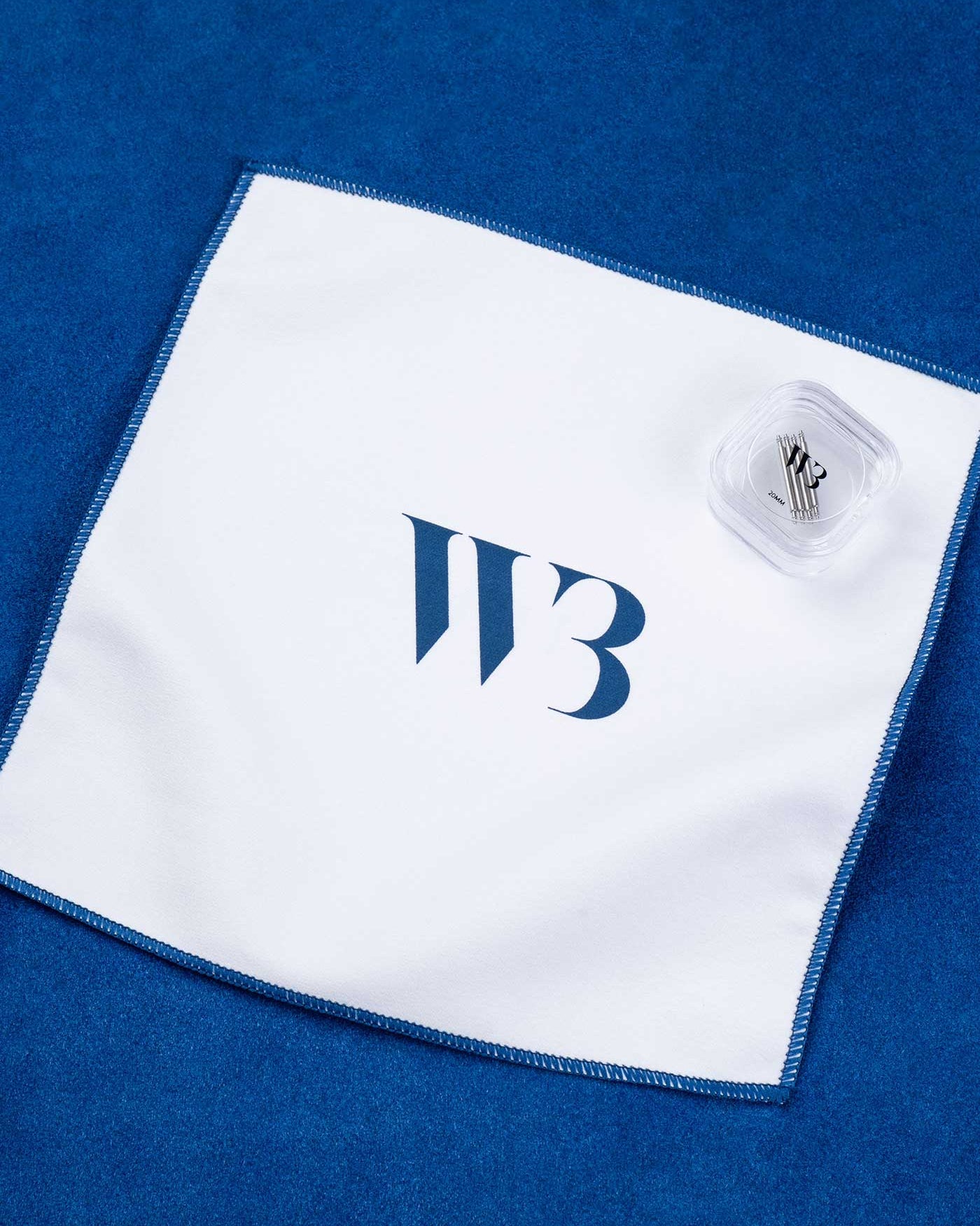 WB Kit - Spring Bars & Cloth on blue background