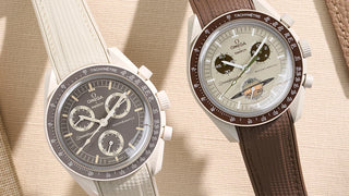 Translation missing: en.Omega X Swatch MoonSwatch Mission to Saturn and Mission to Jupiter, featuring premium rubber straps, displayed on a textured beige background